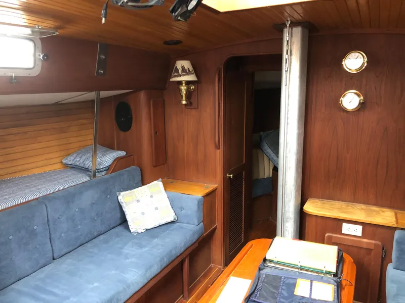 Slide: The Image of Interior of a 1984 Morgan 454 yacht with wooden finish. - 25
