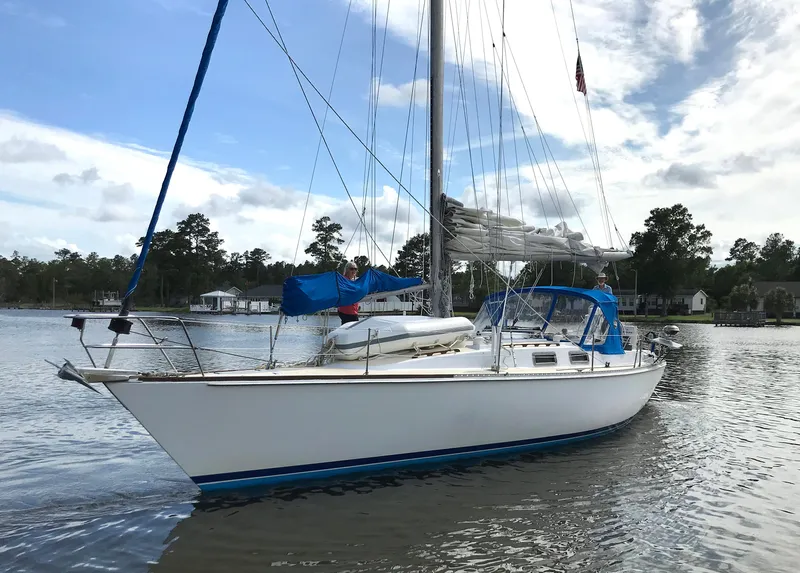 Slide: The Image of 1984 Morgan 454 sailboat on calm water. - 3