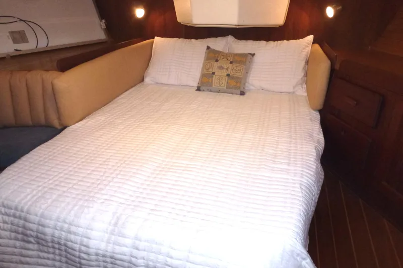 Slide: The Image of Cozy bedroom in 1984 Morgan 454 boat. - 31