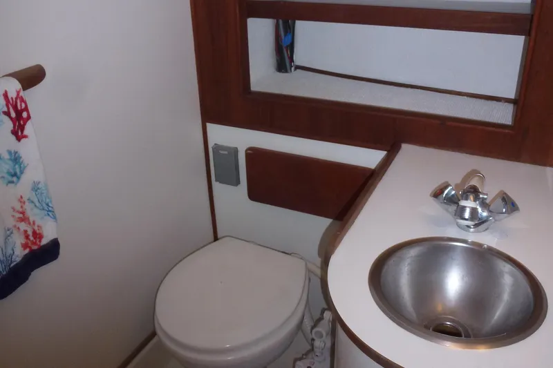 Slide: The Image of 1984 Morgan 454 bathroom with sink and toilet. - 35