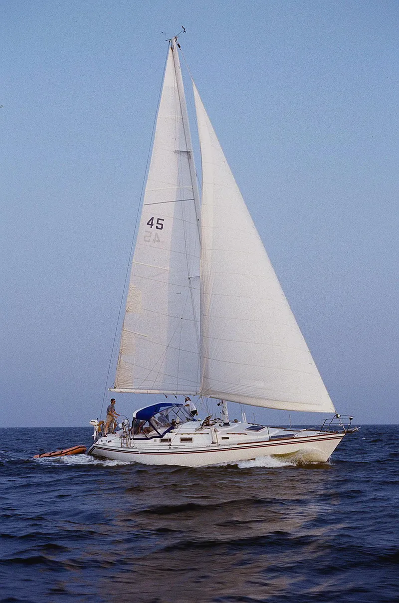 Slide: The Image of 1984 Morgan 454 sailboat on open sea in calm weather. - 5