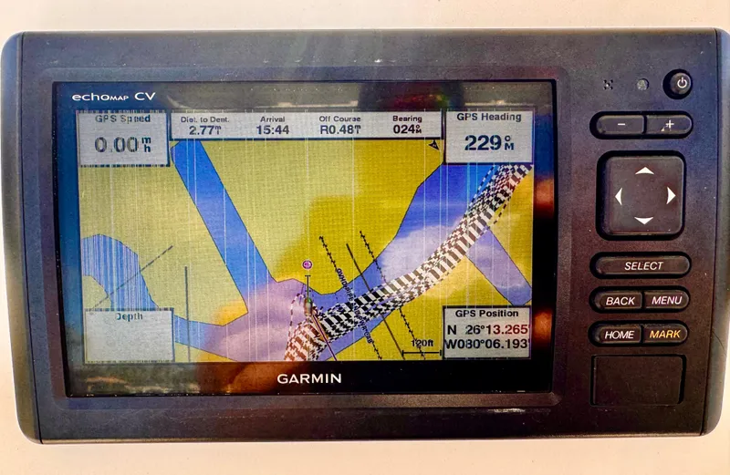 Slide: The Image of Garmin GPS display on 2020 Cobia 220 boat, showing navigation map and coordinates. - 20