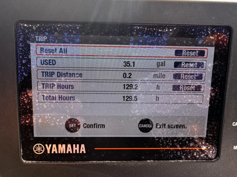 Slide: The Image of Yamaha display showing trip data: 35.1 gallons used, 0.2 miles distance, 129.2 hours. Cobia 220, 2020. - 25