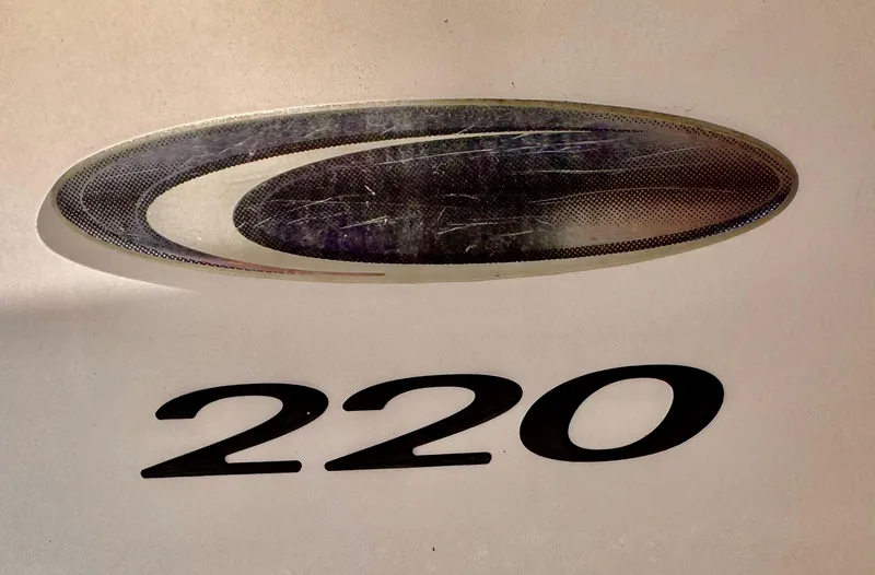 Slide: The Image of Cobia 220 boat logo, 2020 model, featuring sleek design elements. - 27