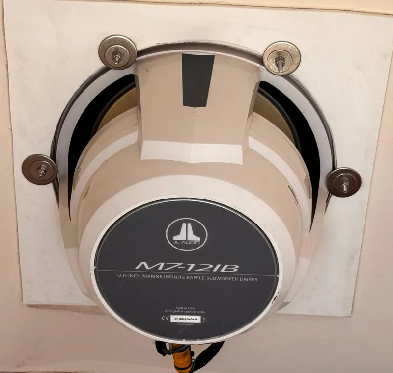 Slide: The Image of 12-inch marine subwoofer installed on a 2020 Cobia 220 boat. - 28