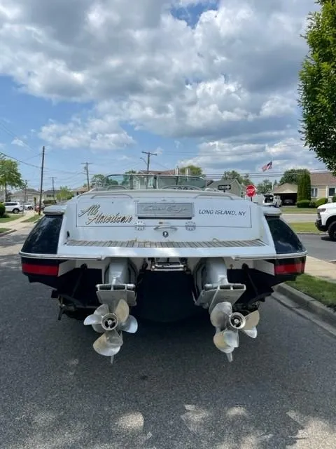 Slide: The Image of 2004 Chris-Craft Corsair 28 boat rear view with dual propellers, Long Island, NY. - 8