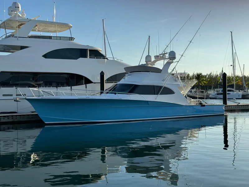 The Image of 2012 Custom Carolina Ritchie Howell 60 Sportfish yacht docked at marina. - 0