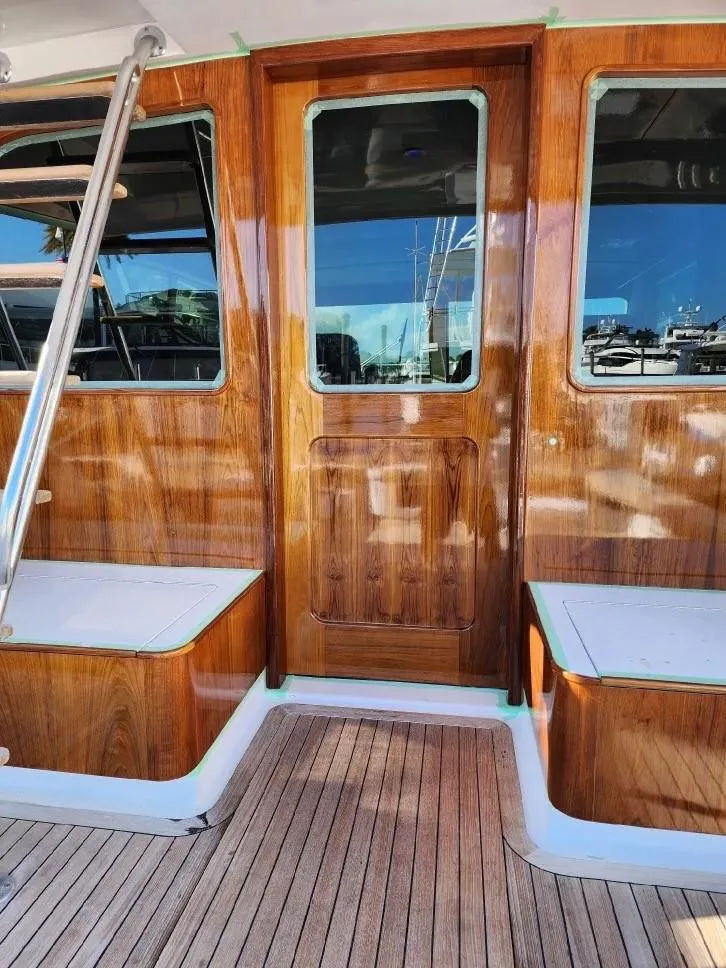 Slide: The Image of 2012 Custom Carolina Ritchie Howell 60 Sportfish, teak deck and polished wood finish. - 11