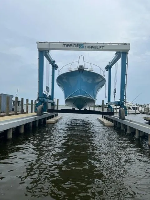 Slide: The Image of 2012 Custom Carolina Ritchie Howell 60 Sportfish on Marine Travelift. - 24