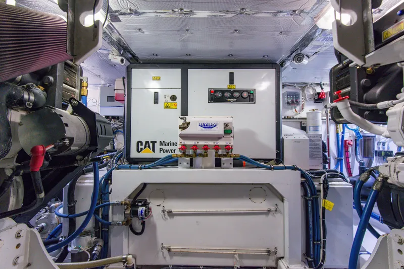 Slide: The Image of Engine room of 2012 Custom Carolina Ritchie Howell 60 Sportfish boat. - 32