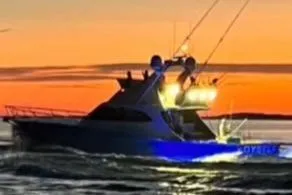 Slide: The Image of Custom Carolina Ritchie Howell 60 Sportfish 2012 at sunset on the water. - 4