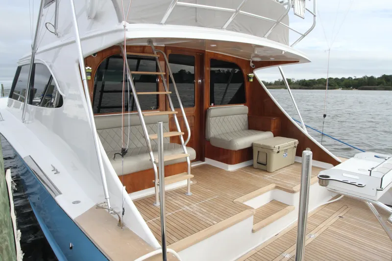 Slide: The Image of 2012 Custom Carolina Ritchie Howell 60 Sportfish yacht with spacious deck and seating. - 43