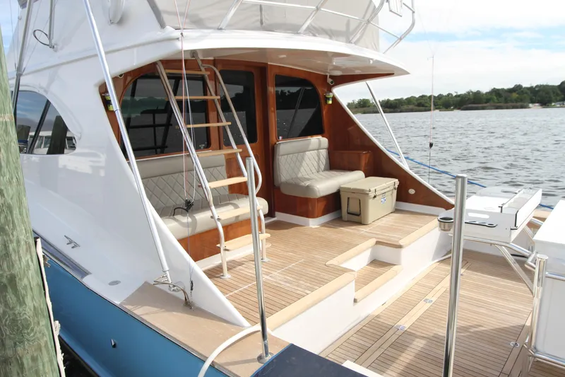 Slide: The Image of 2012 Custom Carolina Ritchie Howell 60 Sportfish yacht with spacious deck and seating area. - 44
