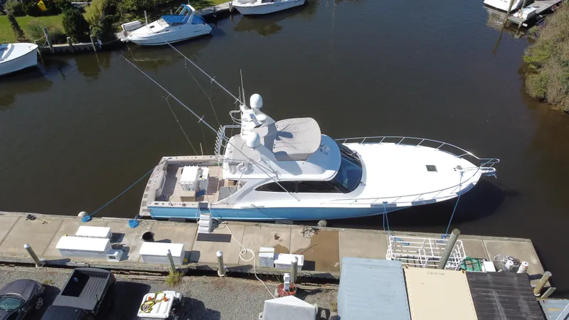 Slide: The Image of Aerial view of a 2012 Custom Carolina Ritchie Howell 60 Sportfish yacht docked. - 6