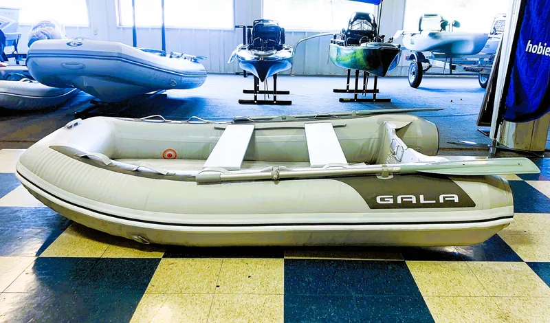 Slide: The Image of 2023 Gala F270 inflatable boat displayed indoors. - 3