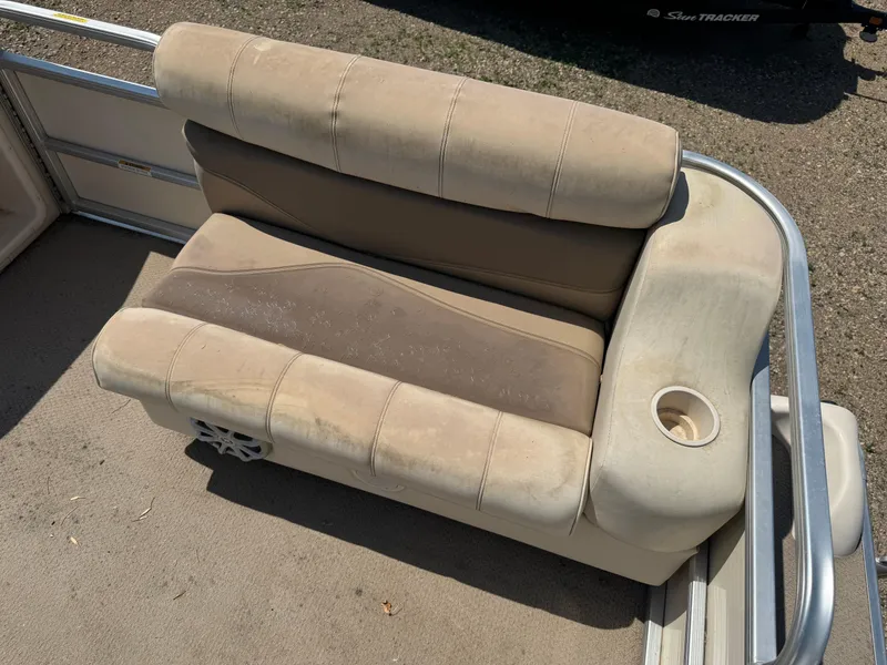 Slide: The Image of Beige seating on 2004 Godfrey SweetWater 2019SC pontoon boat with cup holder. - 6