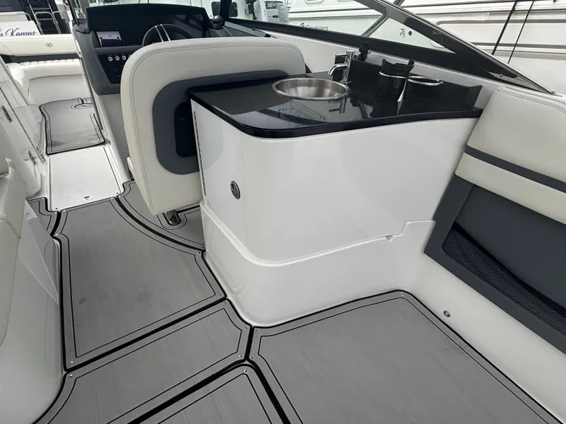 Slide: The Image of 2022 Cobalt 30SC boat interior with sleek design and modern amenities. - 18