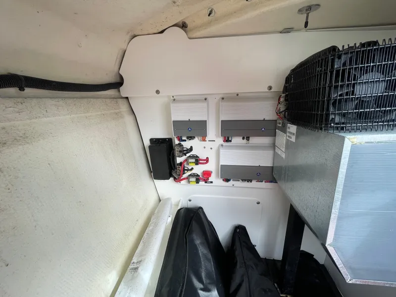 Slide: The Image of 2022 Cobalt 30SC boat interior wiring and electrical components. - 39
