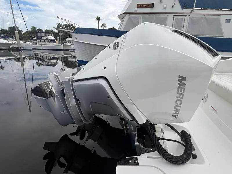 Slide: The Image of 2022 Cobalt 30SC with Mercury outboard engine at marina. - 6