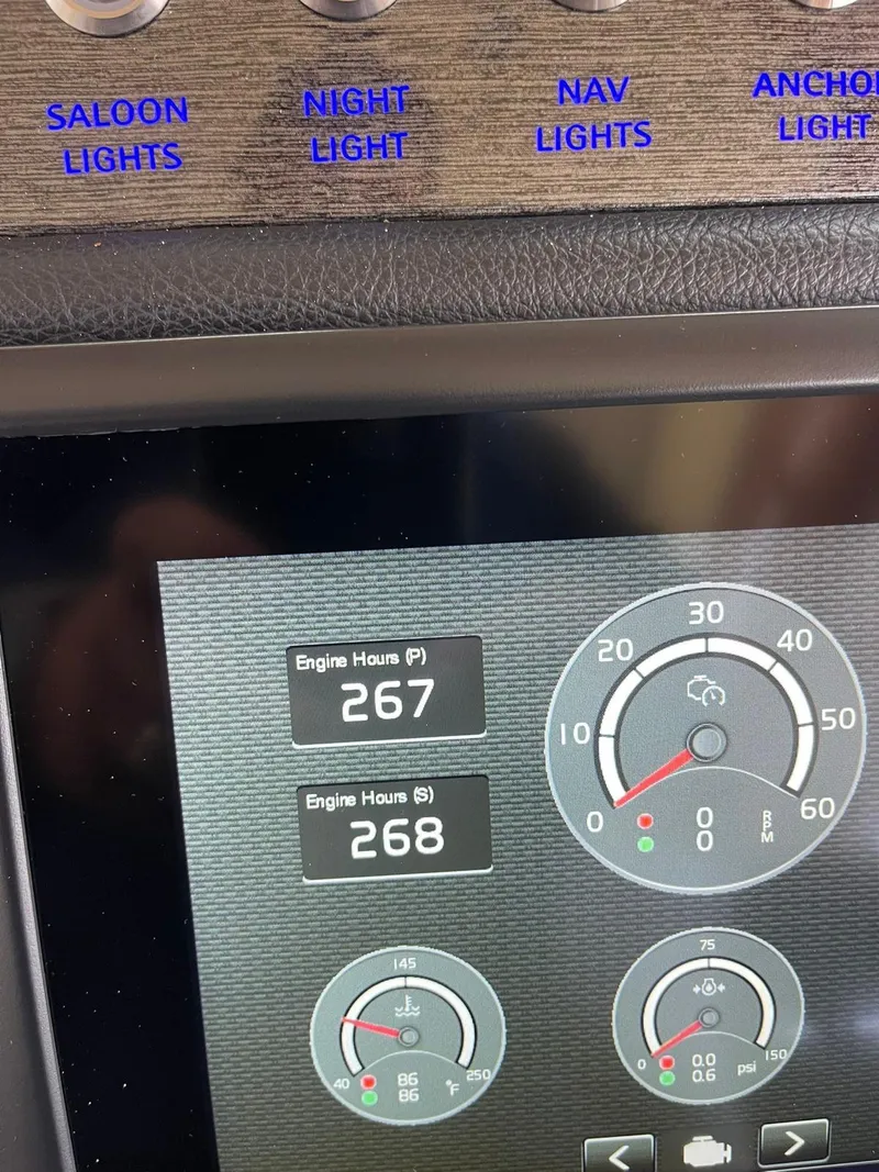 Slide: The Image of Control panel of a 2018 Riviera 60SY yacht displaying engine hours and gauges. - 29