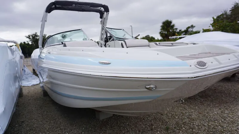 Slide: The Image of 2024 Crownline 260 XS boat with sleek design and modern features. - 3