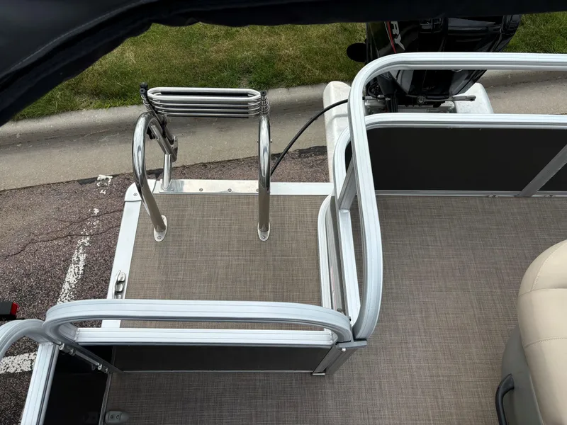 Slide: The Image of 2023 Sun Tracker Party Barge 18 DLX rear deck with boarding ladder. - 8