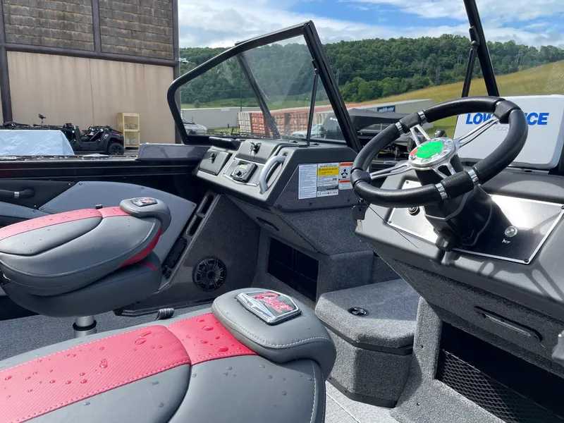 Slide: The Image of 2023 Ranger VX1788 WT boat interior with steering wheel and seats. - 5