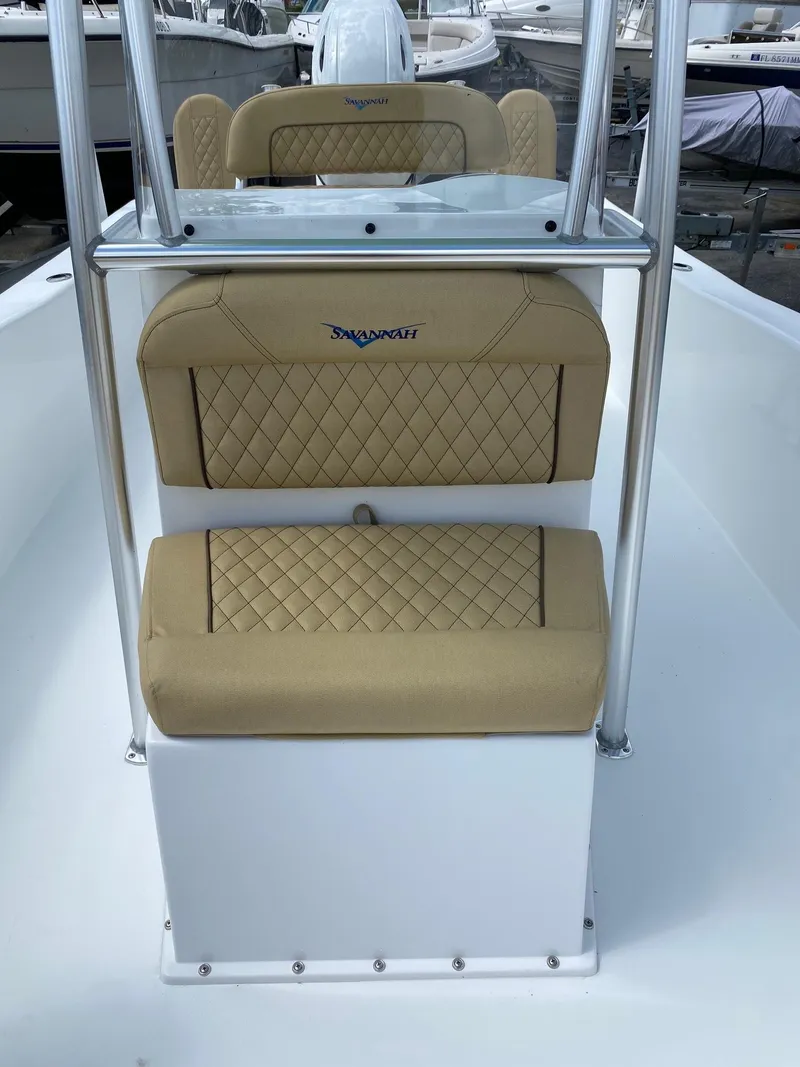 Slide: The Image of 2023 Savannah SS21 boat interior with tan diamond-stitched seats. - 14