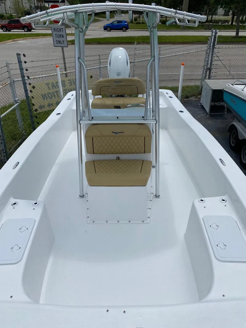 Slide: The Image of 2023 Savannah SS21 boat with beige seating and white deck. - 34