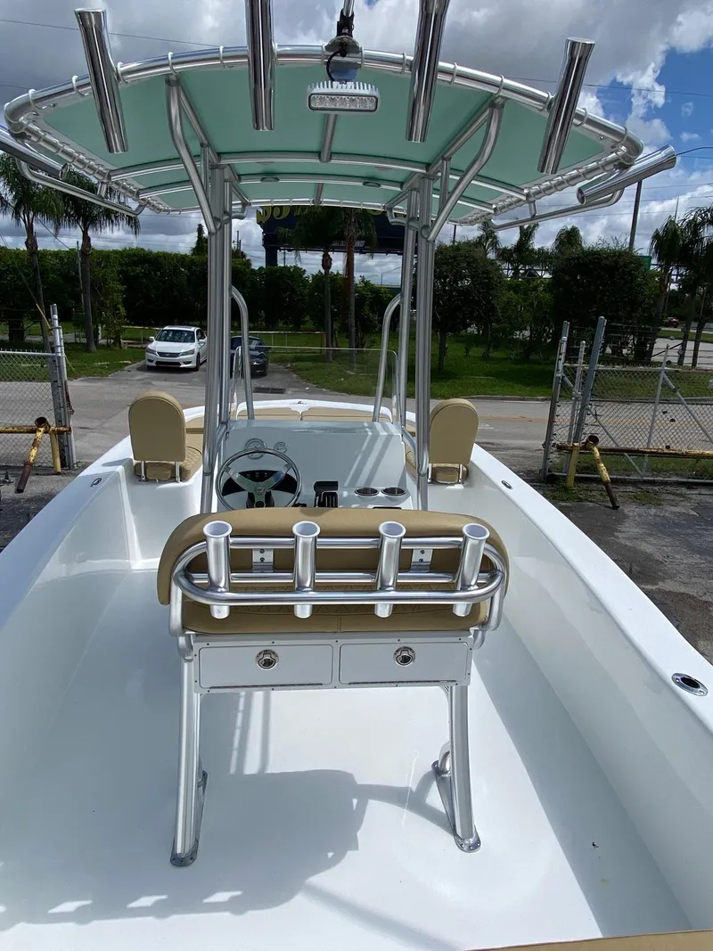 Slide: The Image of 2023 Savannah SS21 boat with T-top and rod holders. - 4