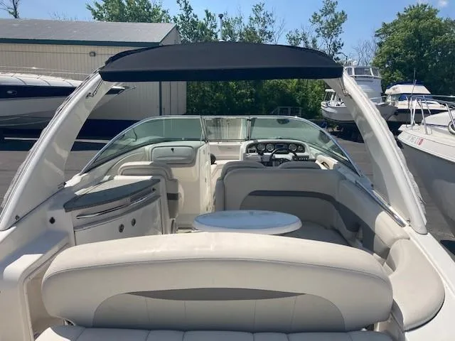 Slide: The Image of 2006 Chaparral 276 SSi boat interior with seating and table. - 2