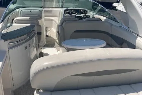 Slide: The Image of 2006 Chaparral 276 SSi boat interior with seating and table. - 8
