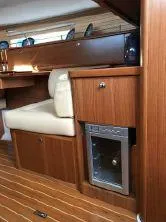Slide: The Image of Interior of 2018 Catalina 425 yacht with wooden cabinetry and cushioned seating. - 18