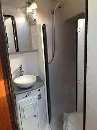 Slide: The Image of 2018 Catalina 425 yacht bathroom with modern sink and shower. - 21