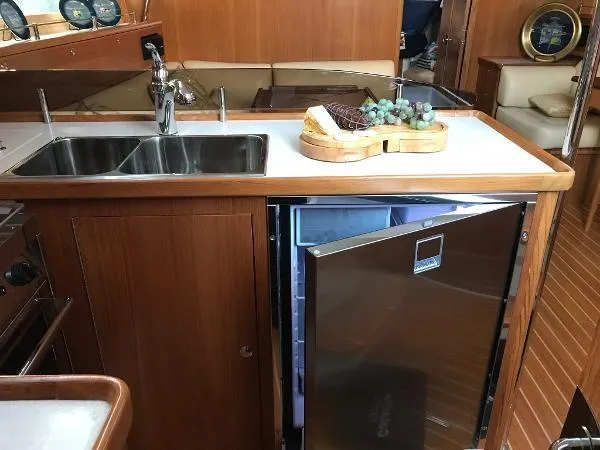 Slide: The Image of Luxurious Catalina 425 yacht kitchen with stainless steel sink and fridge, 2018 model. - 26