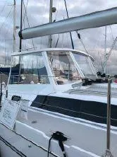 Slide: The Image of 2018 Catalina 425 sailboat docked at marina under cloudy sky. - 4