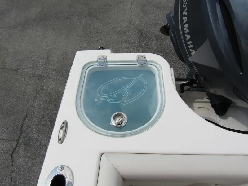 Slide: The Image of 2024 Sailfish 242 CC boat with Yamaha engine and livewell. - 33