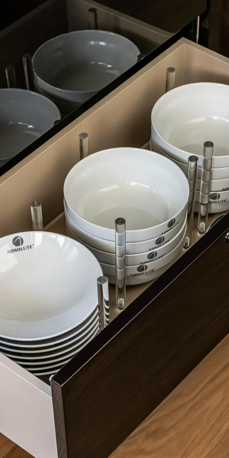 Slide: The Image of Drawer with neatly stacked bowls, Absolute NAVETTA 75, 2025 model. - 26