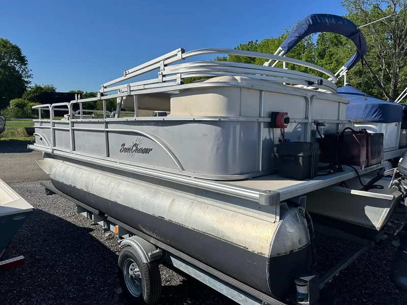 Slide: The Image of 2017 Sun Boatwork Oasis 818 pontoon with Yamaha 50Hp on trailer, parked outdoors. - 5