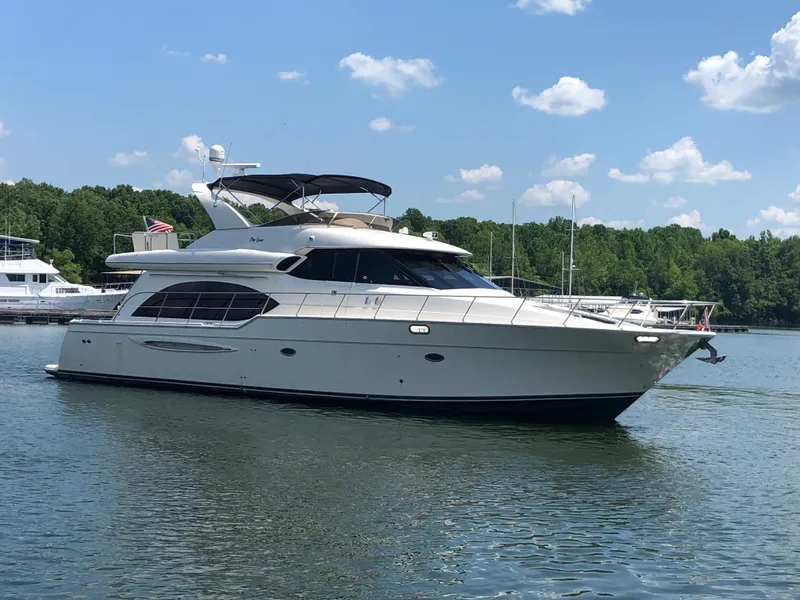 Slide: The Image of 2007 Meridian 580 Pilothouse Yacht on calm water. - 1