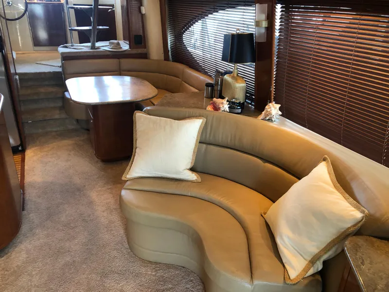 Slide: The Image of Interior of a 2007 Meridian 580 Pilothouse yacht with leather sofa and dining table. - 20