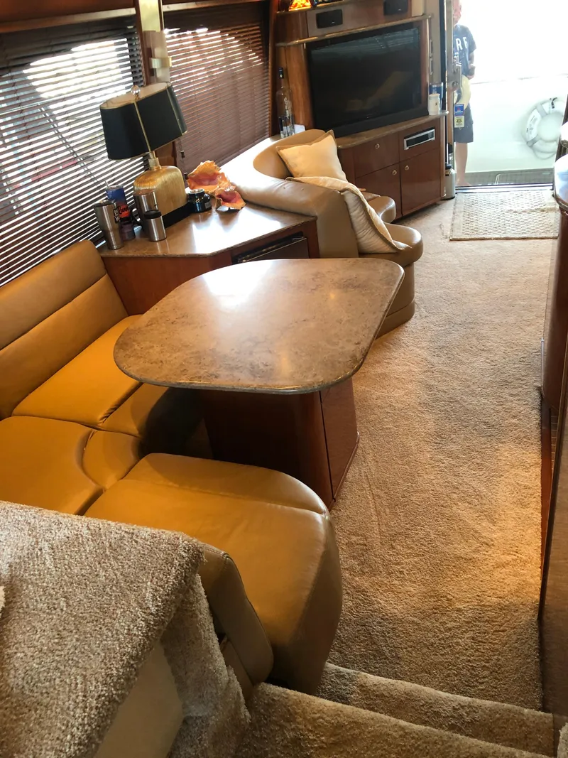 Slide: The Image of Interior of a 2007 Meridian 580 Pilothouse yacht with cozy seating area. - 22