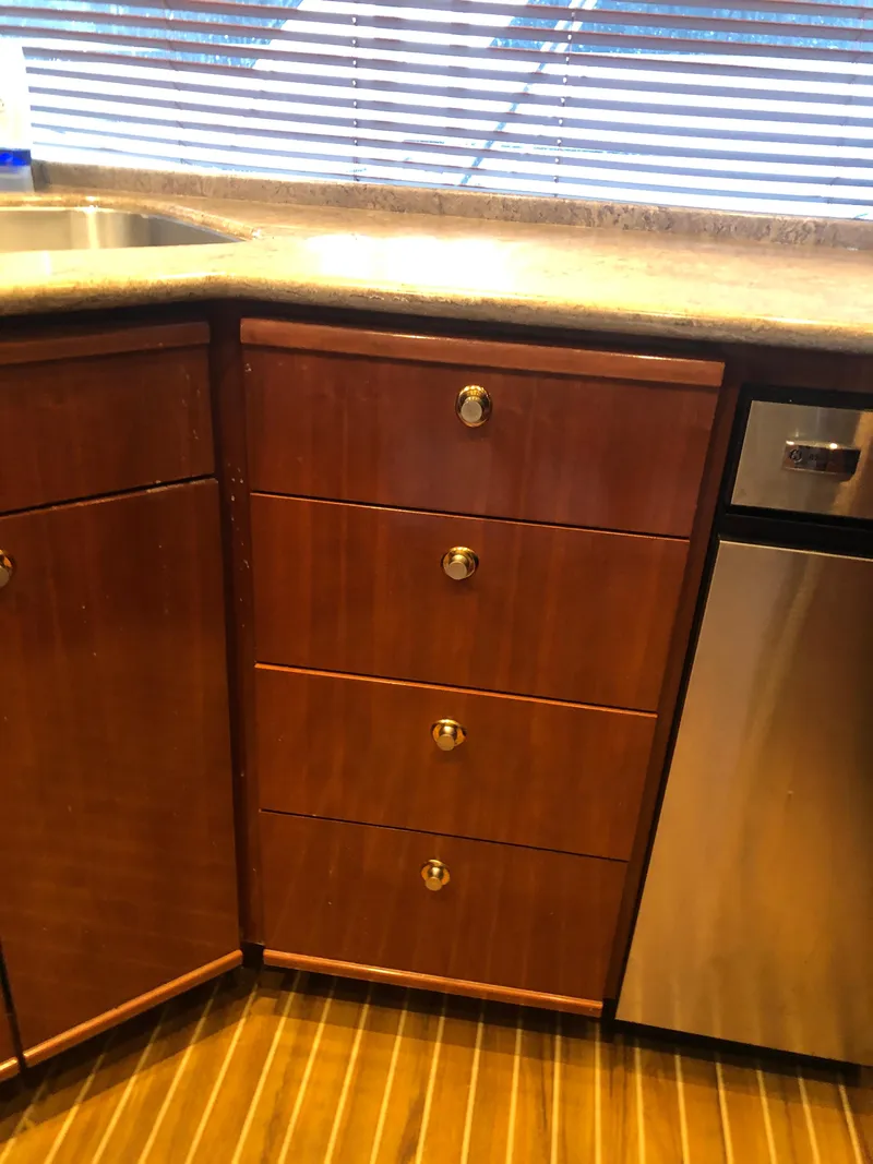 Slide: The Image of Kitchen cabinets in a 2007 Meridian 580 Pilothouse yacht. - 36