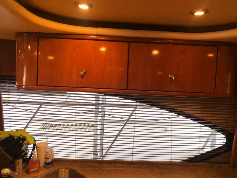 Slide: The Image of Interior of 2007 Meridian 580 Pilothouse yacht with wooden cabinets. - 39