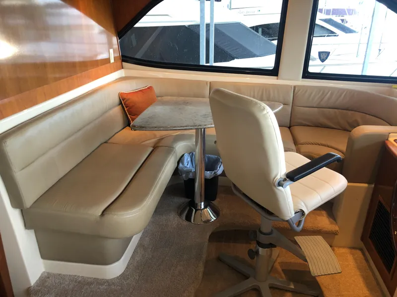 Slide: The Image of Interior of a 2007 Meridian 580 Pilothouse yacht with leather seating. - 46