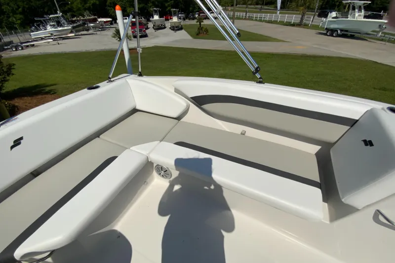 Slide: The Image of 2024 Starcraft SVX 171 boat interior with cushioned seating. - 11
