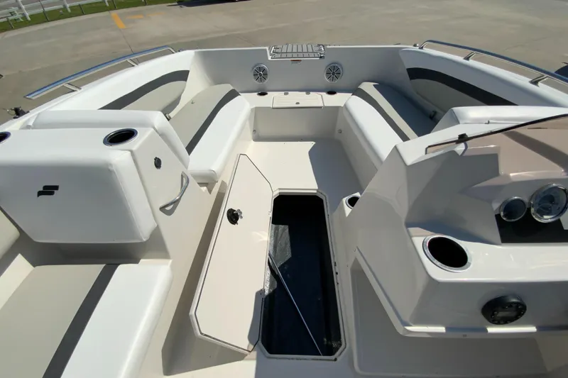 Slide: The Image of 2024 Starcraft SVX 171 boat interior with open storage compartment. - 14
