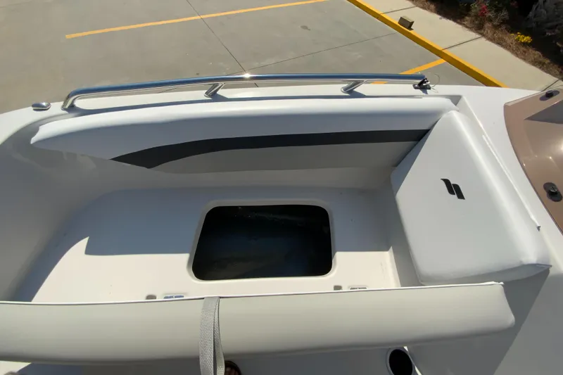 Slide: The Image of 2024 Starcraft SVX 171 boat interior with storage compartment. - 17