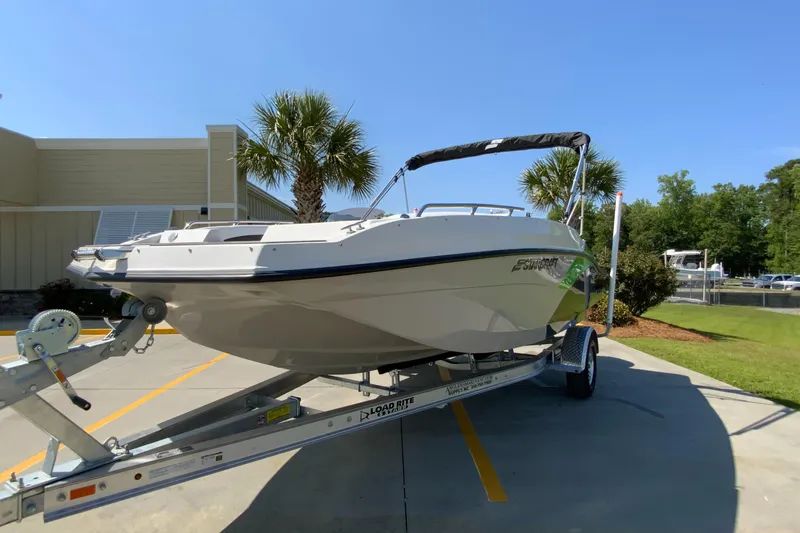 Slide: The Image of 2024 Starcraft SVX 171 boat on a trailer in a sunny outdoor setting. - 3