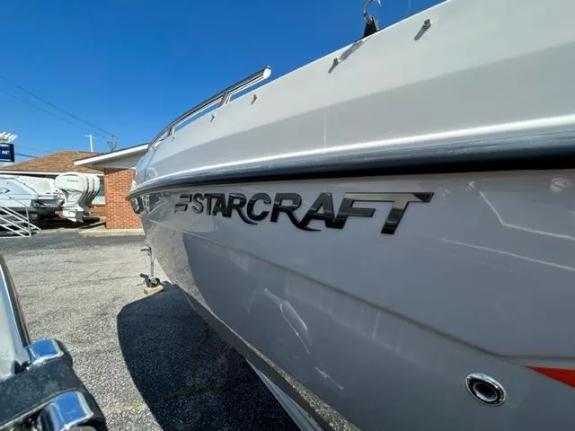 Slide: The Image of 2024 Starcraft SVX 191 boat side view in a parking lot. - 14